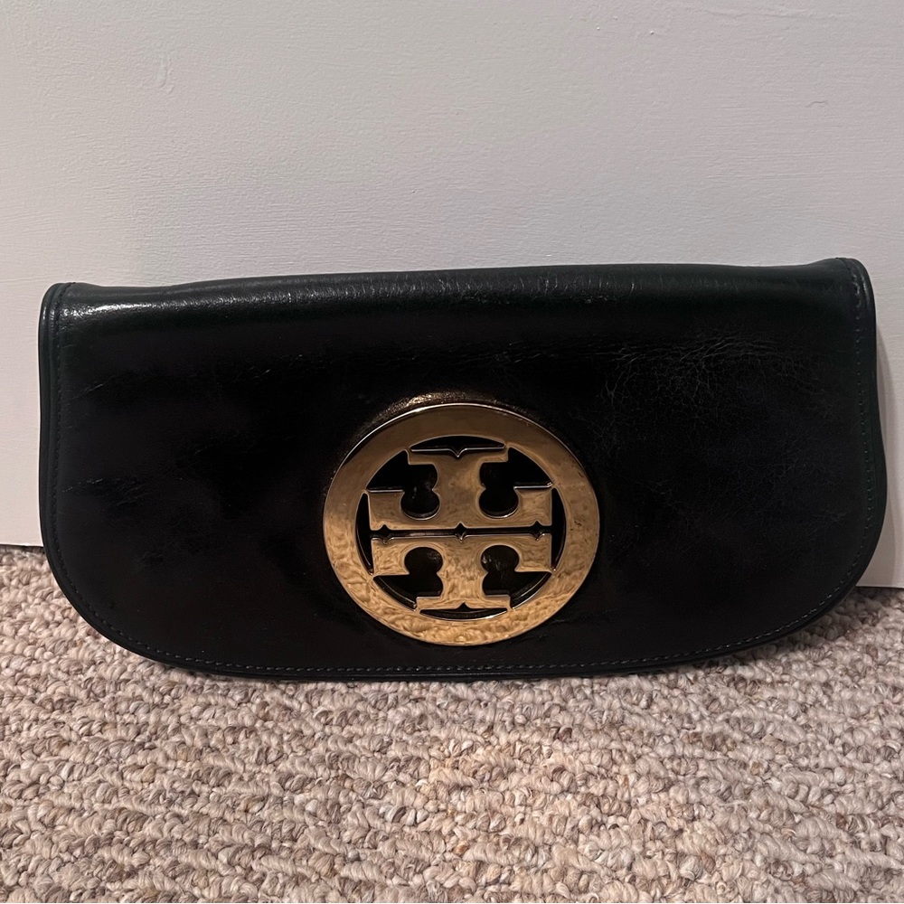 Tory Burch clutch with added chain strap.